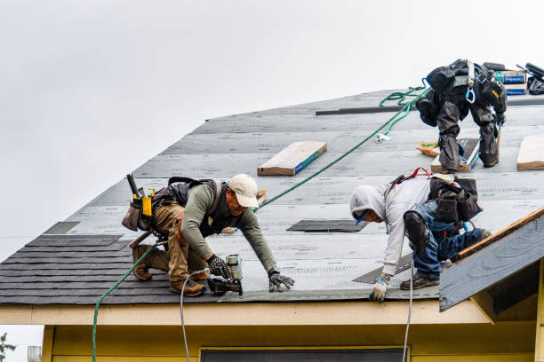 Professional Gutter Installation technician working in Silver Lake, OR